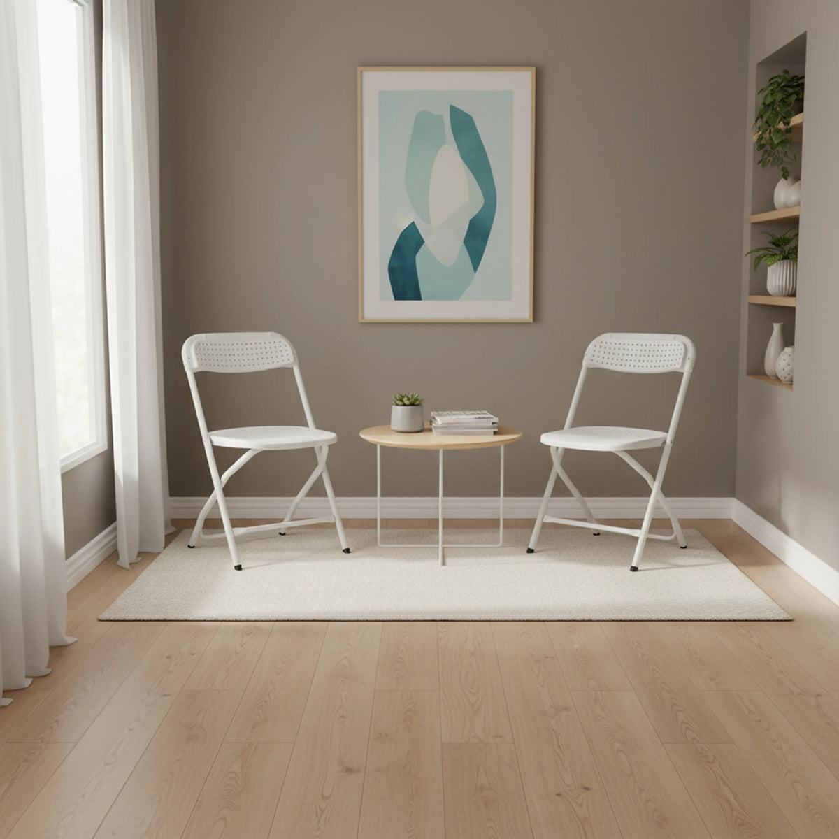 To hvide TUDELA XXL PRO W udendørs stole med et rundt sidebord i et moderne indrettet rum fra hjh OFFICE