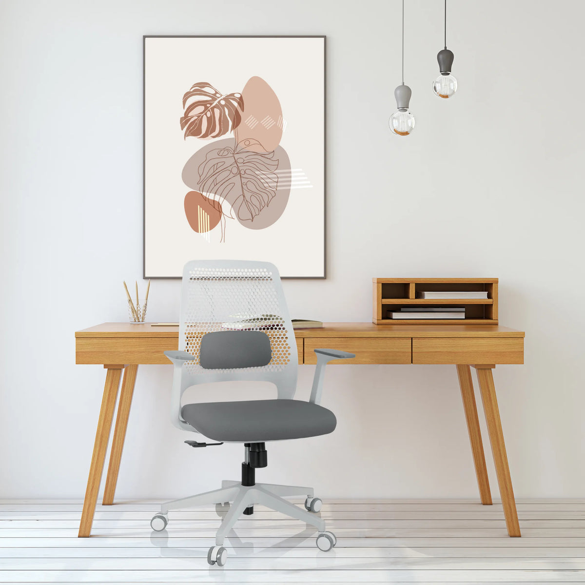 Grå PARFERIO W Home Office kontorstol med netryglæn og hjul foran et skrivebord fra hjh OFFICE