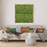 Grøn plantemåtte LEAFLUXE 3 som kvadratisk vægbillede over en sofa fra hjh LIVING