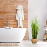 Grøn kunstig plante CORTADERIA i en flettet kurv som dekoration fra hjh OFFICE
