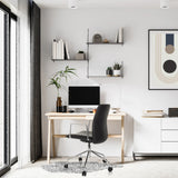 Luksus-chefstol VEMONA 30 i sort med armlæn og hjul ved et skrivebord fra hjh OFFICE