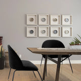 Sort polstret stol VELVO med slanke metalben ved et spisebord fra hjh OFFICE