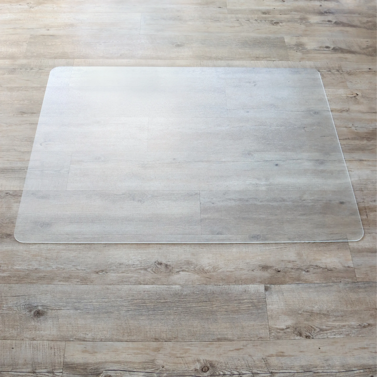 Gennemsigtig Gulvbeskyttelsesmåtte PUNOMAT til hårde gulve i formatet 120 x 90 cm fra Kottig