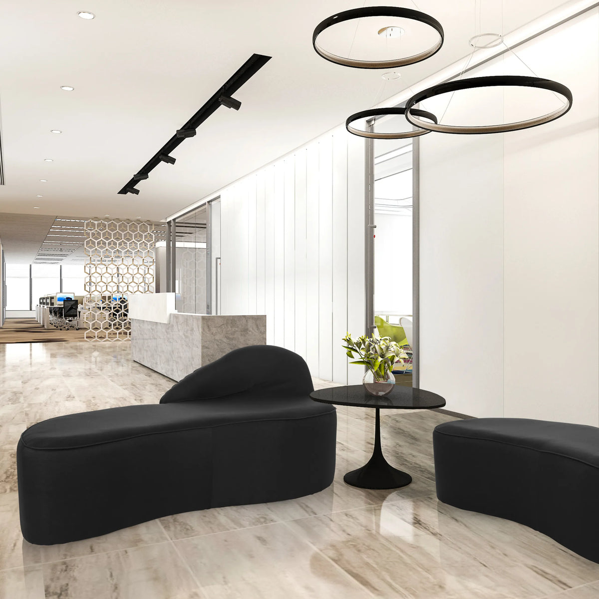 Sort loungesofa BARACOA i et moderne kontormiljø med et sidebord fra hjh OFFICE