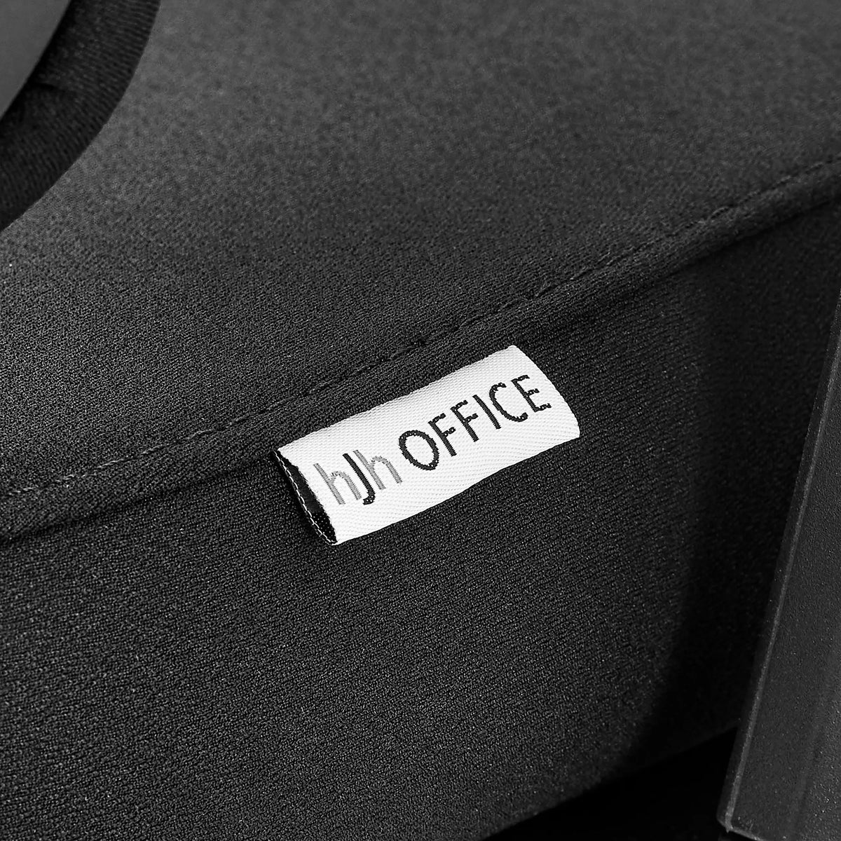 Vævet logo-label på det sorte stofbetræk på Professionel kontorstol Ergomy F 2 fra hjh OFFICE