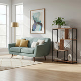 Regal Kalag Eco in Schwarz und Eiche mit offenem Metallgestell und Holzböden in einem Wohnraum von hjh LIVING