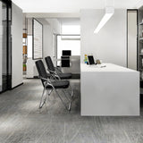 To sorte ESTO klapstole med stel af forkromet metal i et moderne kontormiljø fra hjh OFFICE