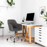 Dunkelgrauer Home-Office-Bürostuhl SOLAO 300 mit Sternfuß und Rollen vor einem Schreibtisch von hjh OFFICE