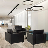 Tre sorte BAVERO Loungelænestole i kunstlæder i en moderne kontorlounge fra hjh OFFICE