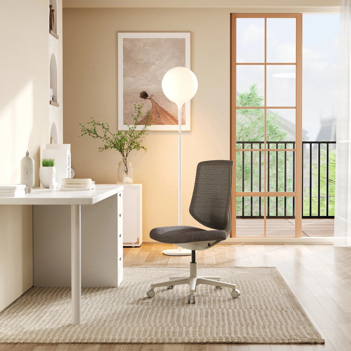 Home Office kontorstol Sitflex Lady i grå med krydsfod på hjul i et lyst rum fra hjh OFFICE