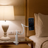 Hvid FLEXMOBI I holder til mobiltelefon & tablet med fleksibel svanehalsarm på et natbord fra hjh OFFICE