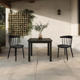 To sorte spisestuestole ARTIFO RIB med en matchende bordgruppe fra hjh LIVING